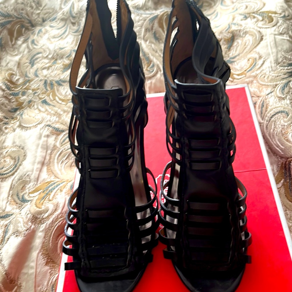 Black Coach heels never worn 5 inc heel